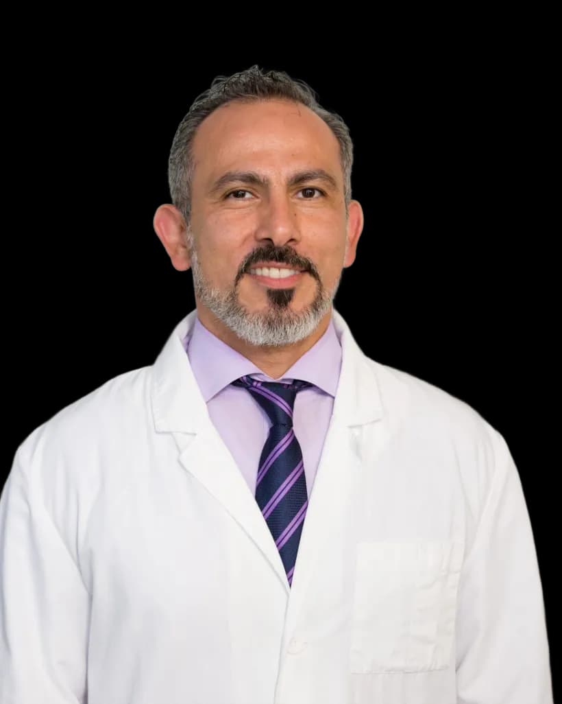 Dr. Alizadeh welcoming a patie